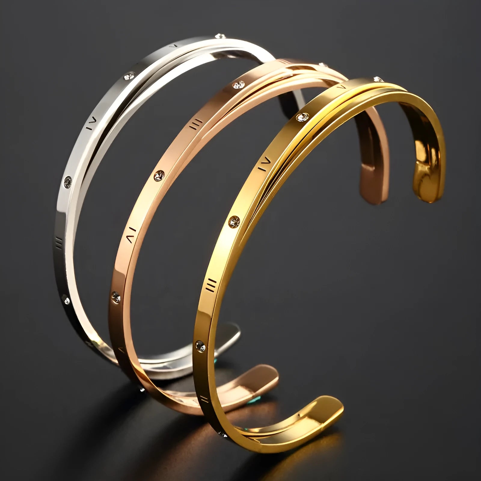 Open-ended stainless steel bracelet for women with inlaid zircon stones in rose, gold, or steel colour.