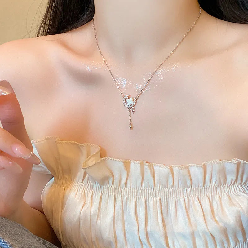 Gold or silver women's necklace with star moon zirconium pendant on adjustable chain.