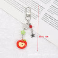 Fruit pattern mobile phone charm keychain with apple and strawberry designs on plastic resin