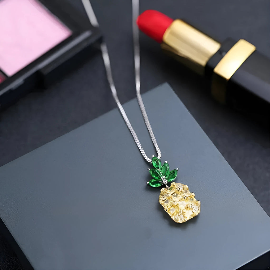 Silver plated women's necklace with a geometric pineapple diamond charm.