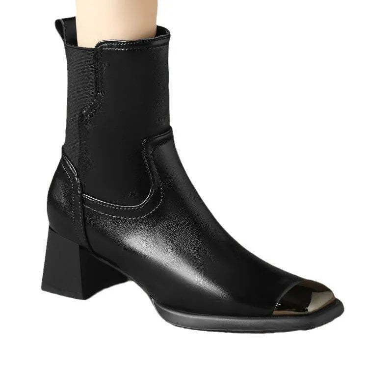 Brown cowhide leather women's ankle boots with a high heel and side zipper closure on a white background.