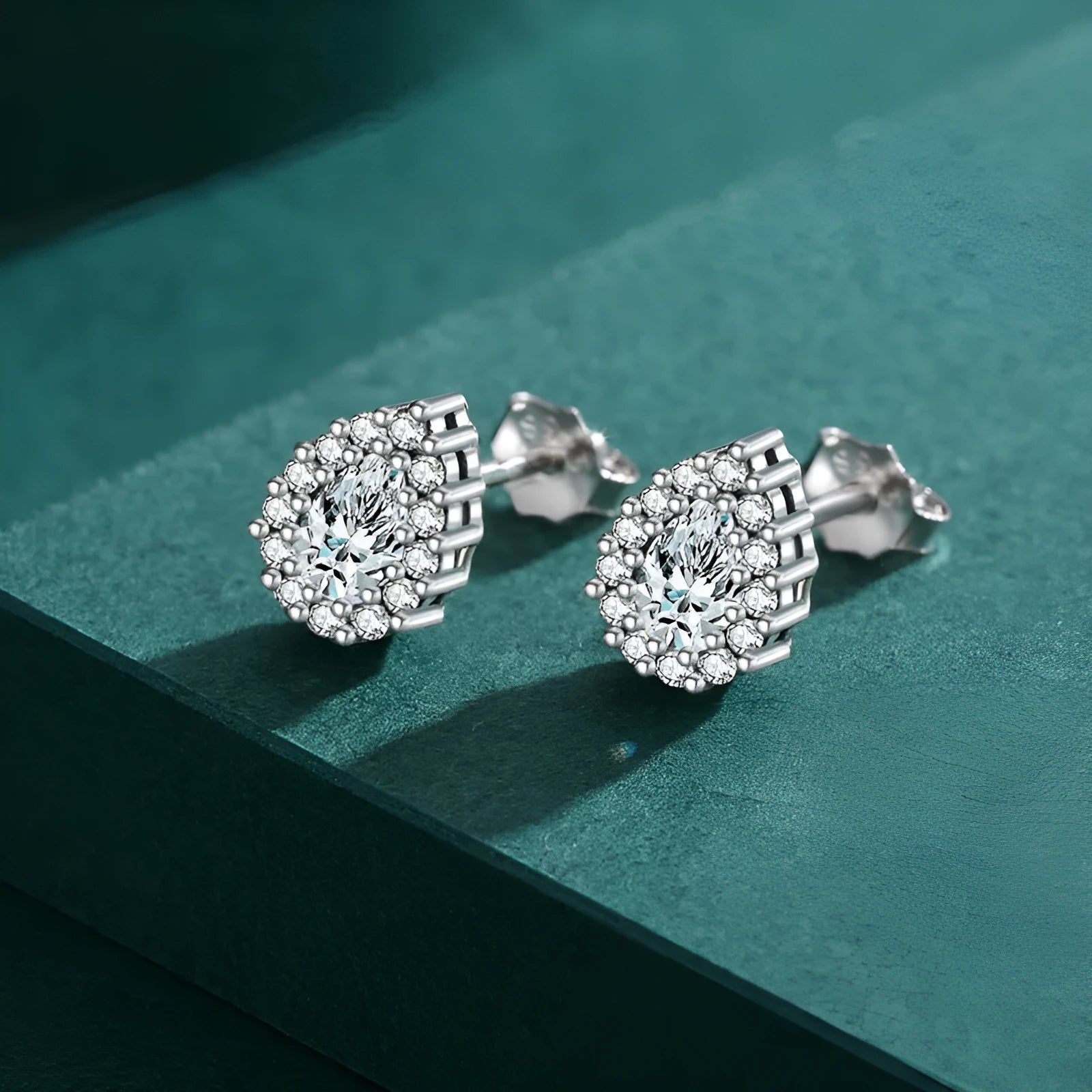 Silver water drop ear studs with diamond treatment on 925 sterling silver