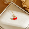 Delicate titanium steel necklace with strawberry, cherry, or pepper charm on an O-ring chain in golden or zircon finishes.