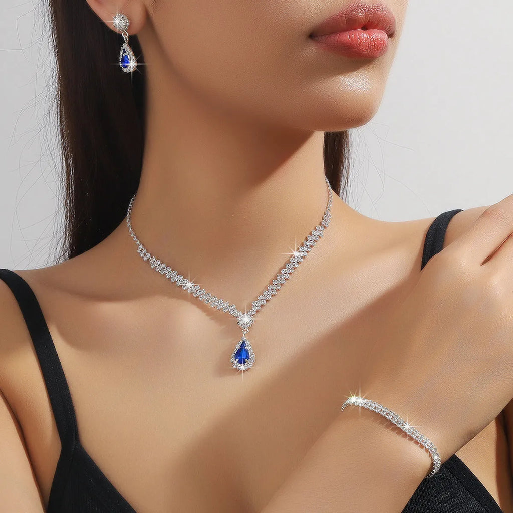 Claw chain rhinestone necklace and matching earrings set with water drop shapes