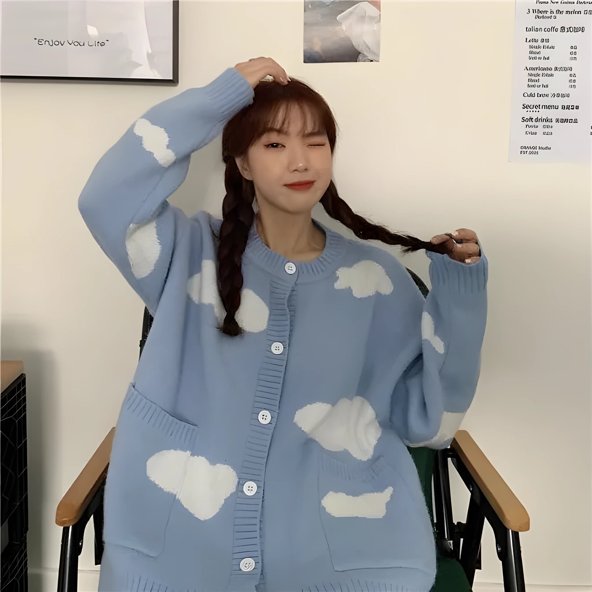 Blue cloud pattern women's loose cardigan sweater with long sleeves.