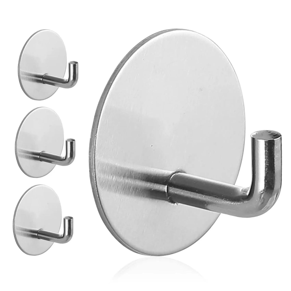 Pair of round stainless steel self-adhesive hooks, one black sanded and one polished, for bathroom or kitchen wall mounting.