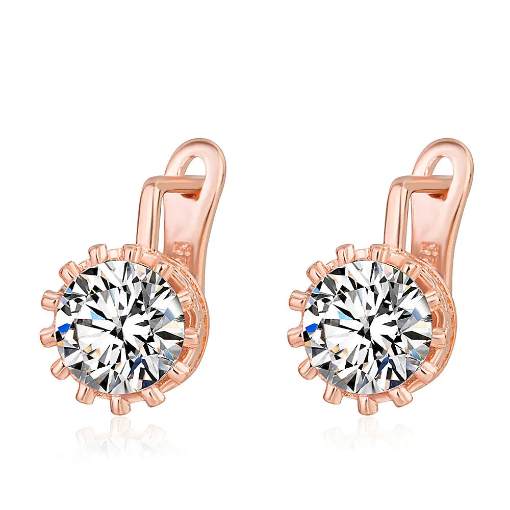Korean retro crown-shaped clip-on earrings with white diamond accents in rose gold and white gold colours.