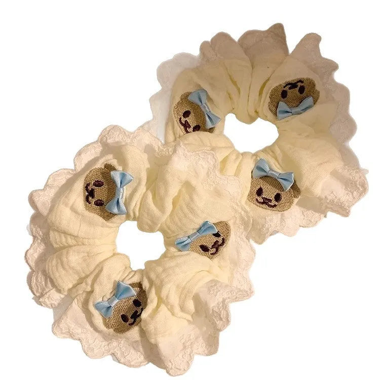 Bear blue cloth hair ring with bowknot design and high elasticity construction