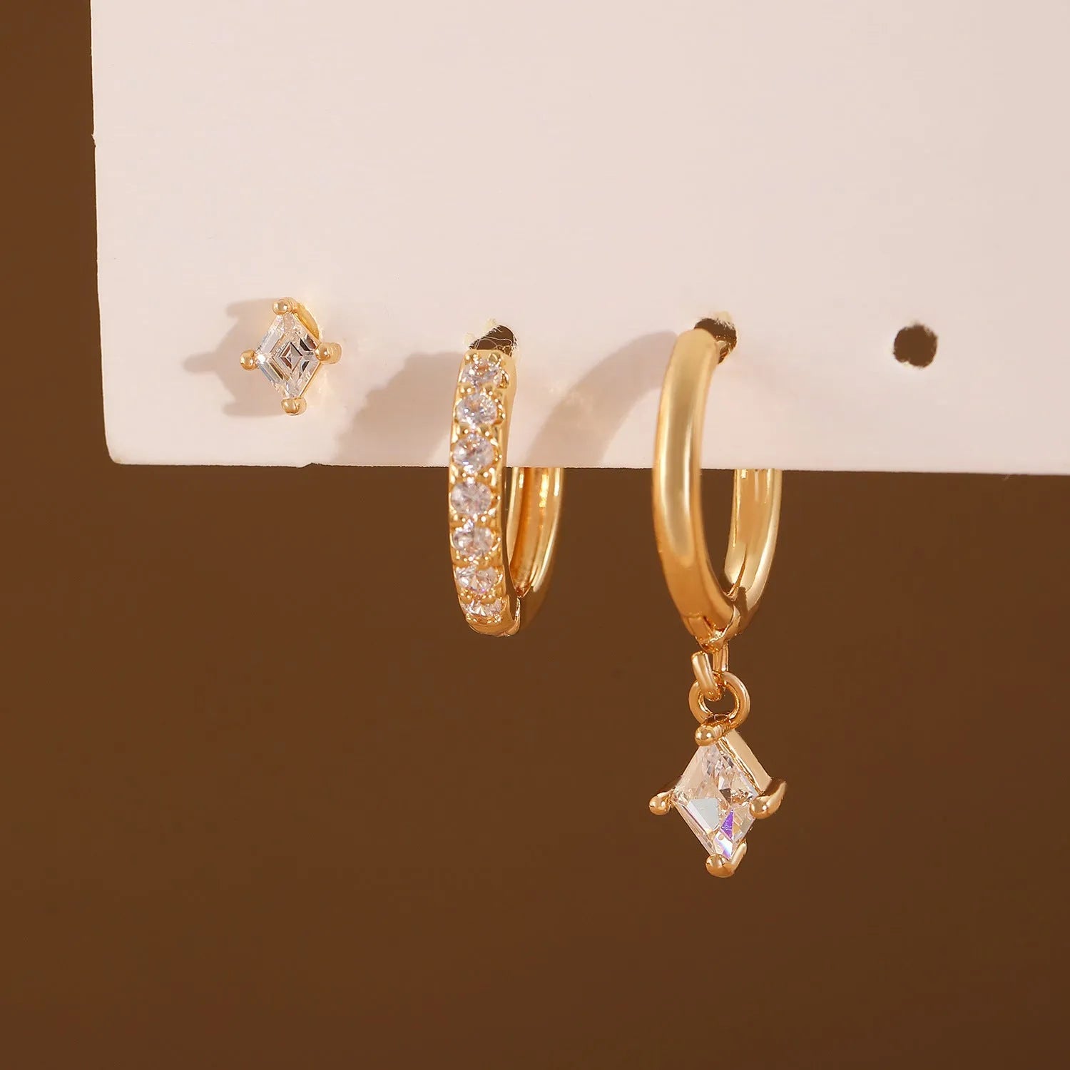 Ladies three-piece zircon earring set with geometric rhombus designs in gold and white colours