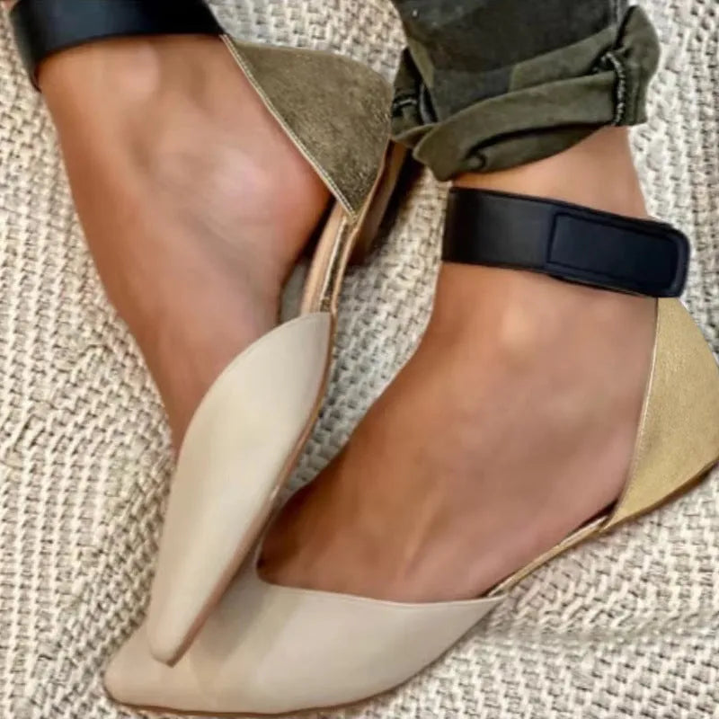 Women's beige casual sandals with hollowed design and adjustable Velcro straps on a flat heel