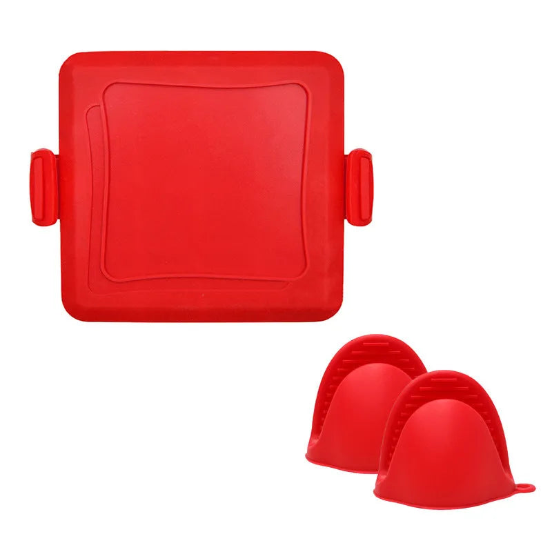 Red silicone baking tray with matching anti-scald gloves on kitchen counter