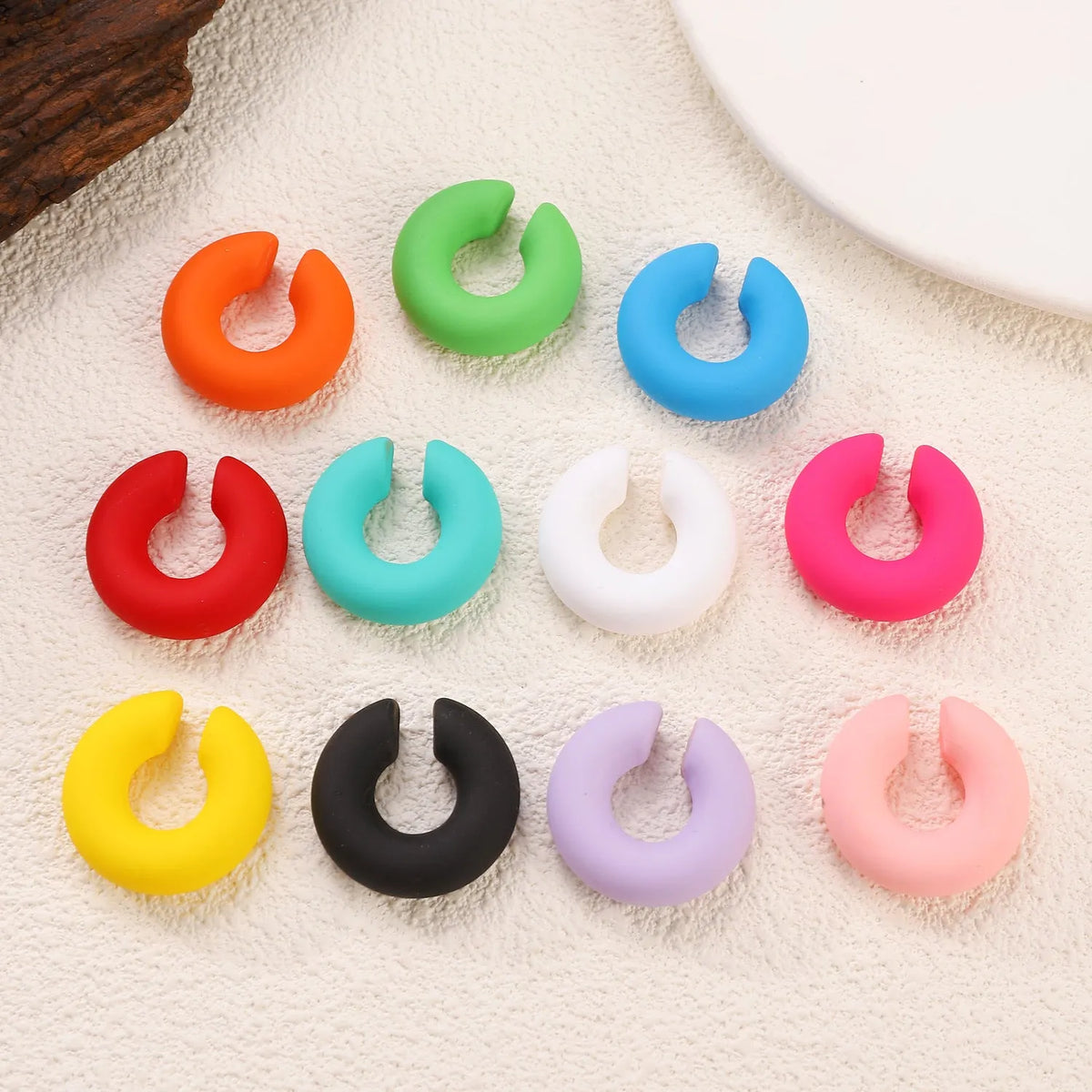 Matte C-shaped CCB non-piercing ear clip in geometric ring style available in multiple candy colours for women