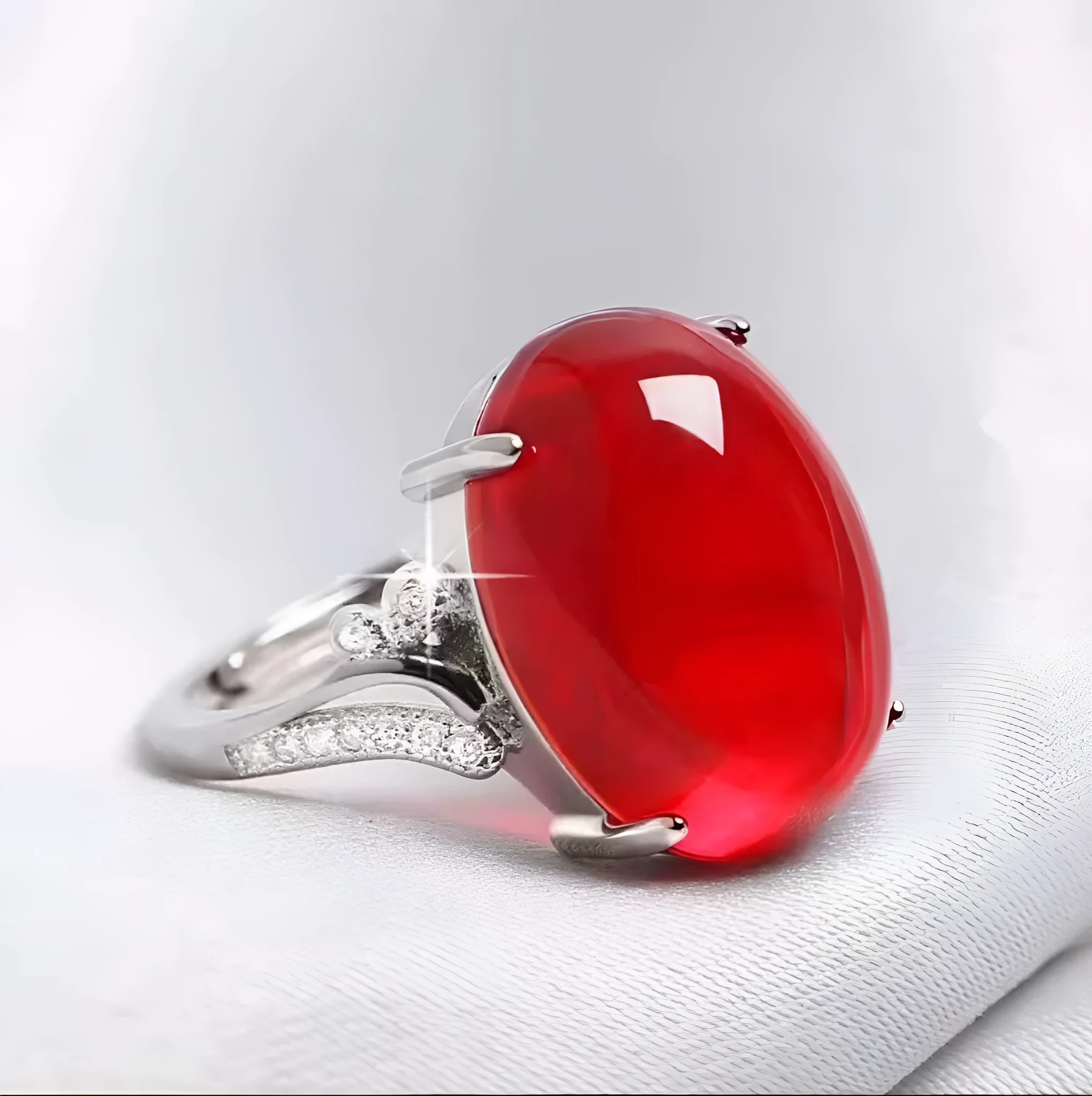 Adjustable alloy ring with geometric ethnic pattern in multiple colour options on a finger.