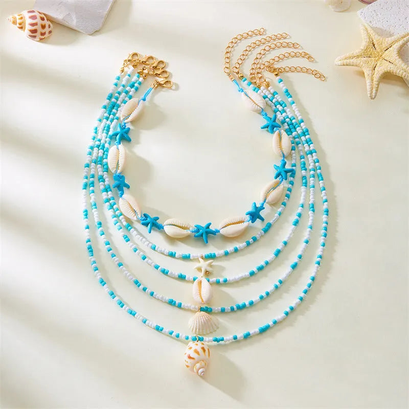 Women's starfish shell bead necklace five-piece set showing blue and multicolour designs with adjustable chains