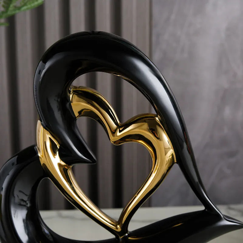 Modern white porcelain Love Heart ornament with a geometric design in a metallic gold finish.