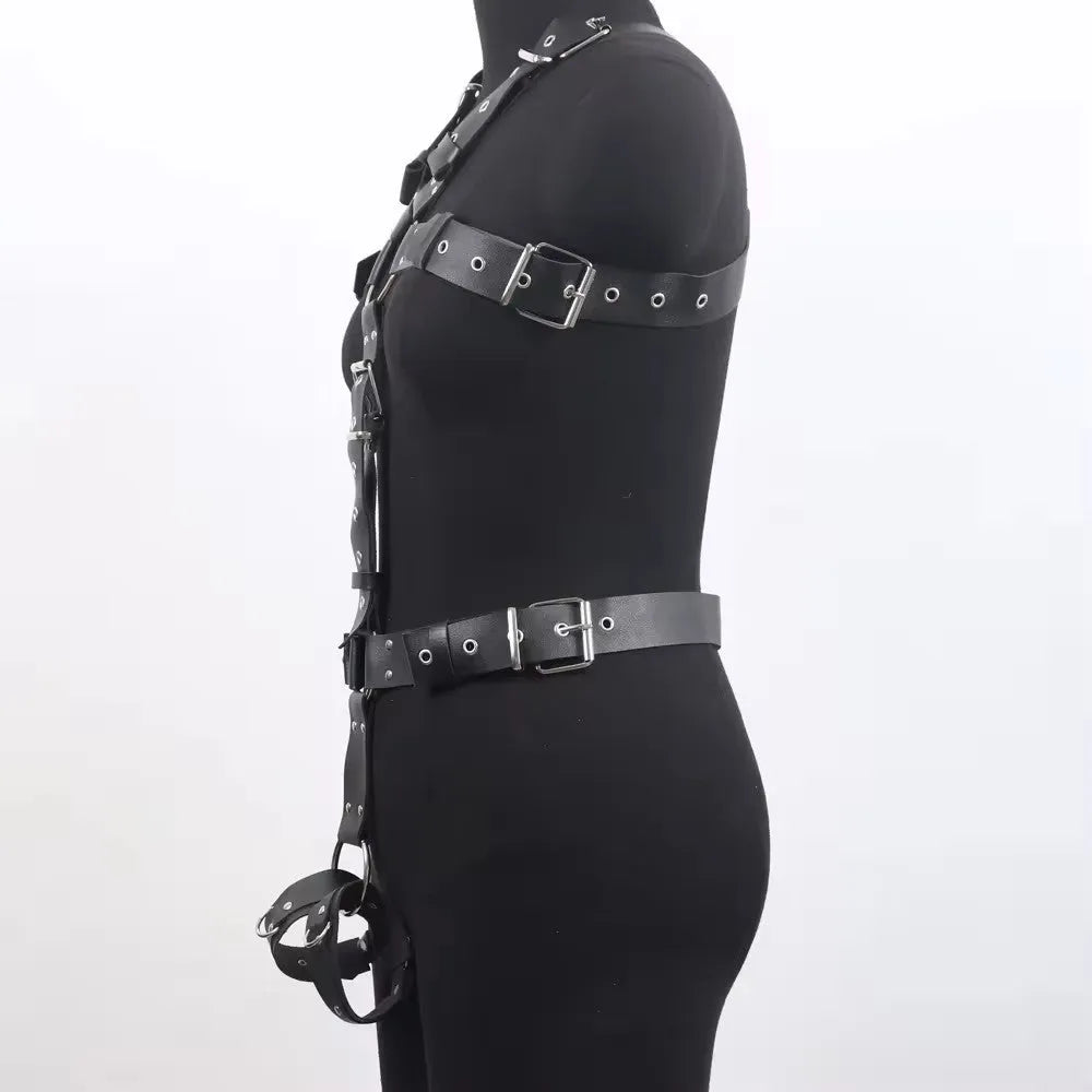 Black patent leather shapewear body suit with a thin adjustable belt and pin buckle fastening.