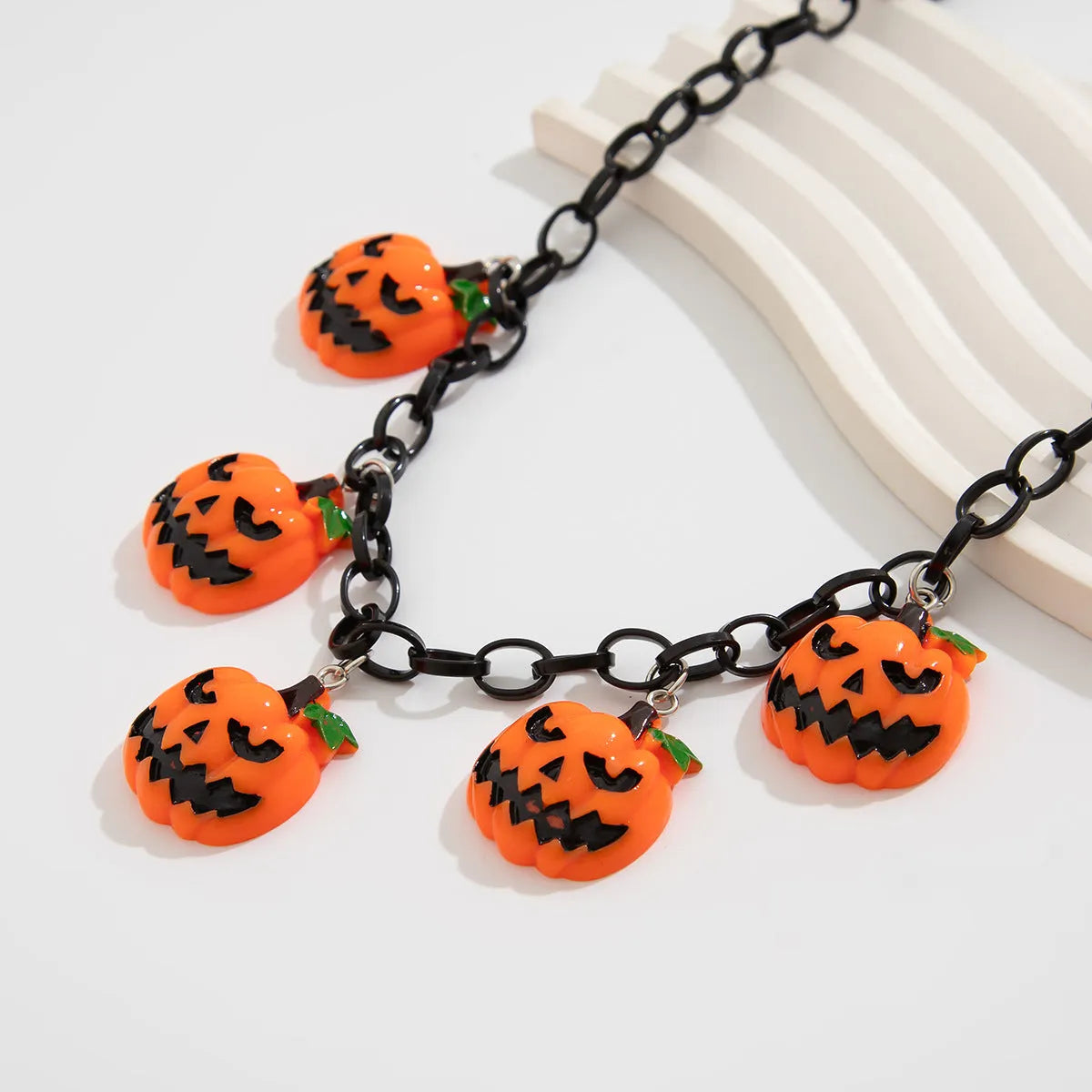 Mixed colour Halloween ghost pumpkin cartoon pendant necklace on a regular chain.