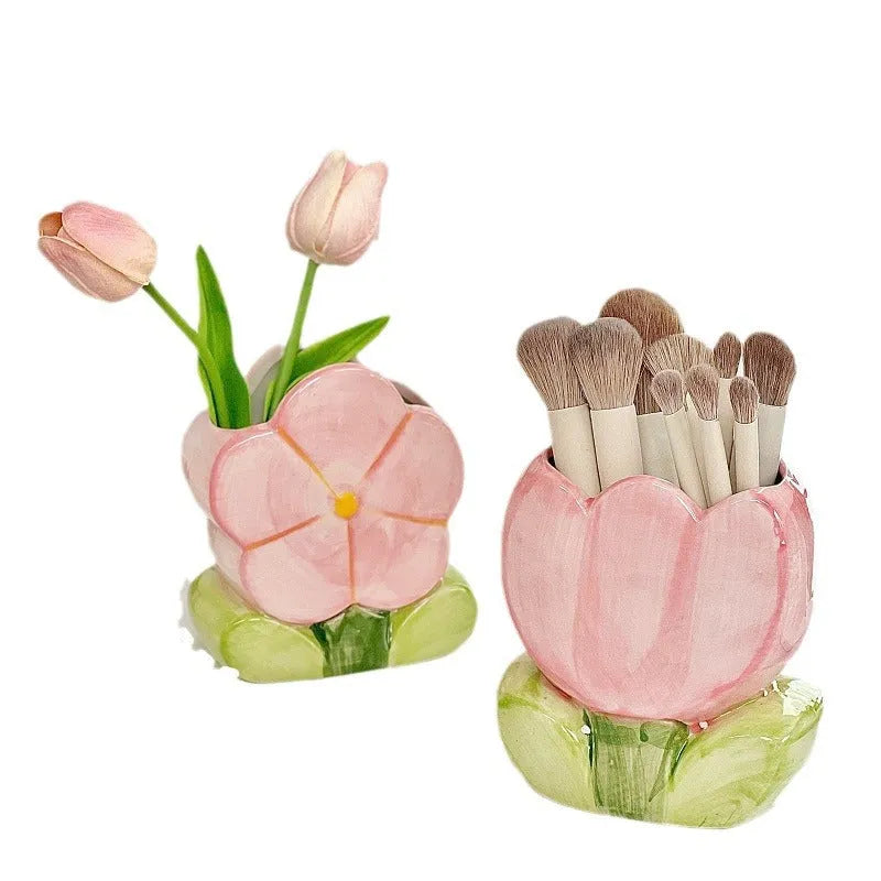 Ceramic desktop pen holder box with floral design in blue, pink, or purple.