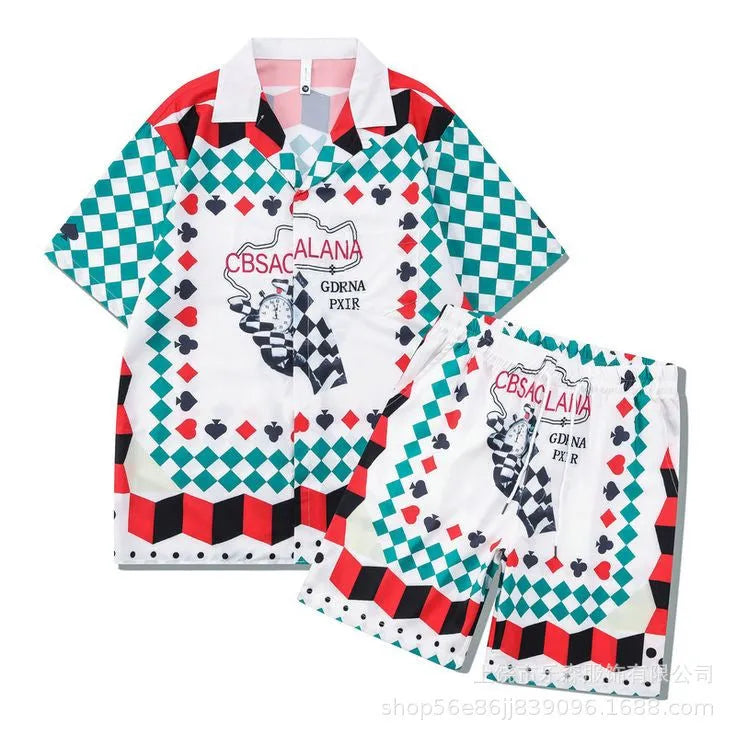 Men's plaid printed beach outfit set showing a short sleeve shirt and matching trousers on a manikin.