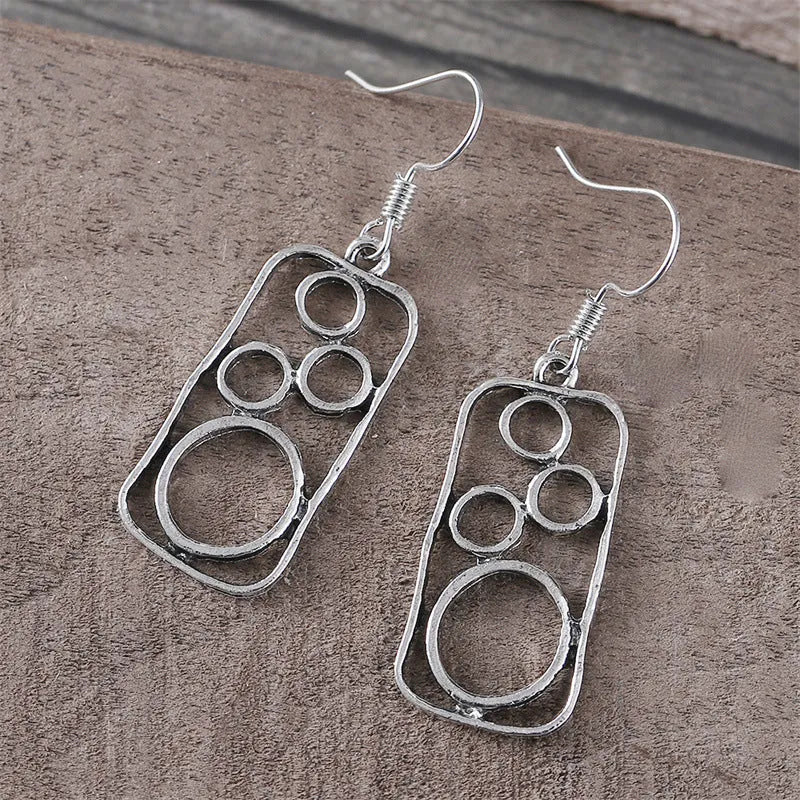 Geometric square earrings with round ring detailing in antique silver colour