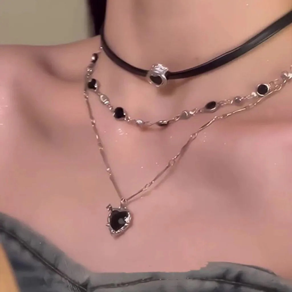 Women's multi-layer twin necklace set with leather heart pendants and adjustable clavicle chain
