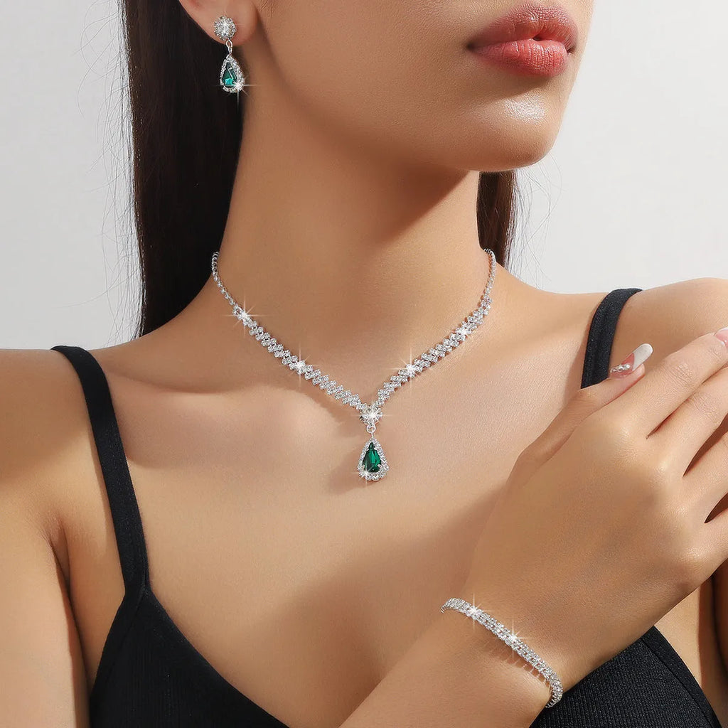 Claw chain rhinestone necklace and matching earrings set with water drop shapes