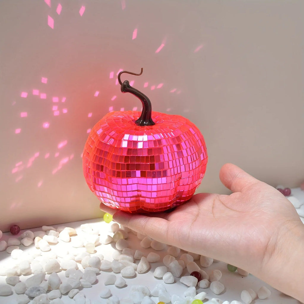 Chinese style glass pumpkin mirror decoration in bionic design for Halloween and home decor.
