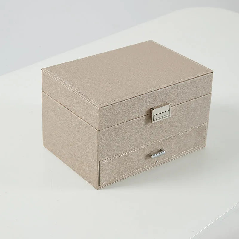 PU leather jewellery storage box in beige, black, pink, and rose gold colours measuring 22.5cm x 15.5cm x 14cm