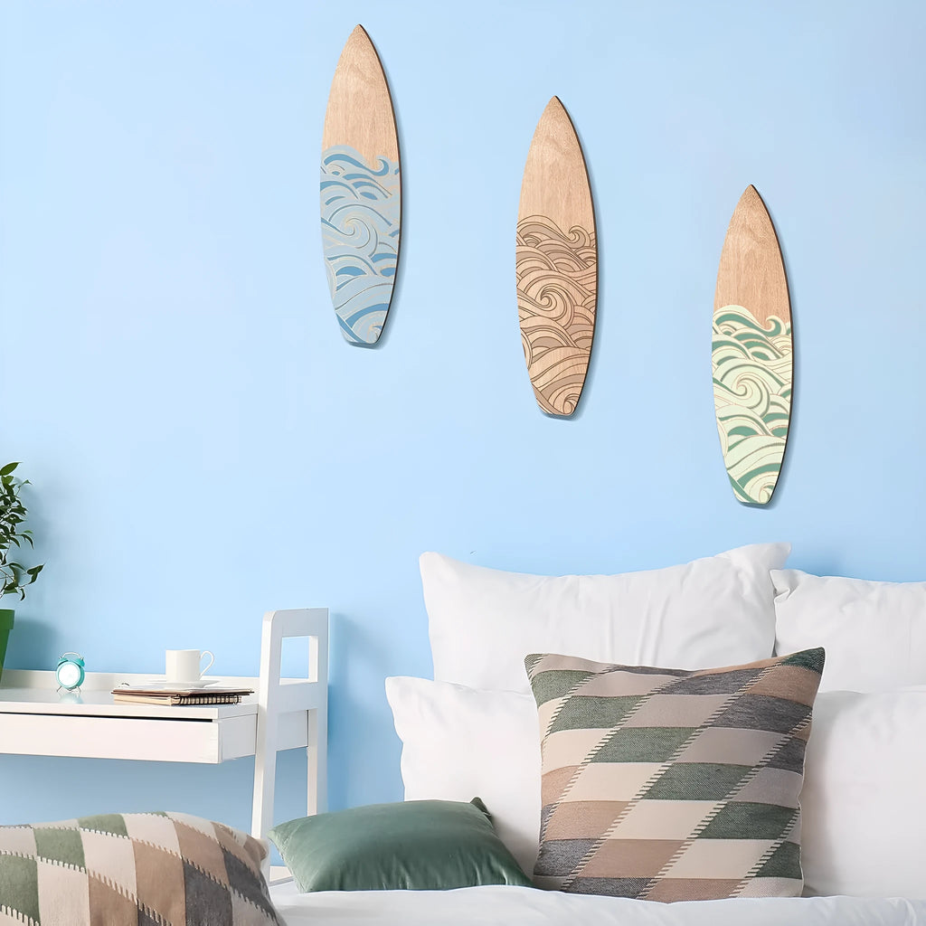 Three identical wooden surfboard wall decorations made from boxwood for beach themed rooms