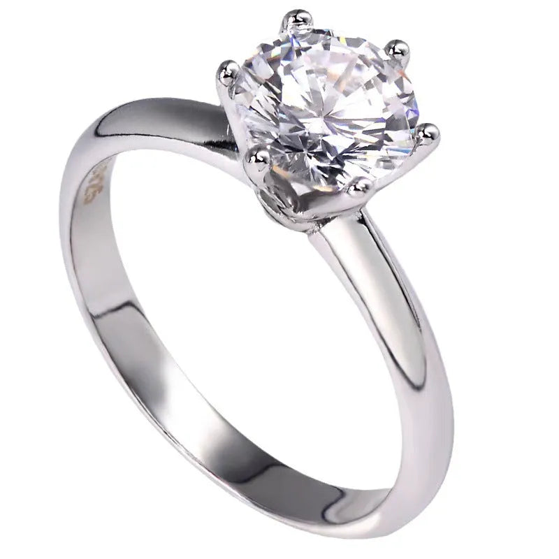Women's zircon ring with six-claw setting in white gold plated geometric design
