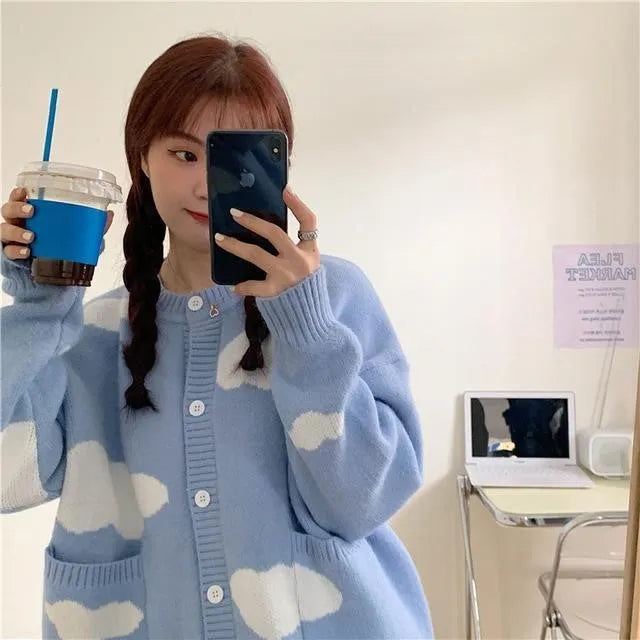 Blue cloud pattern women's loose cardigan sweater with long sleeves.
