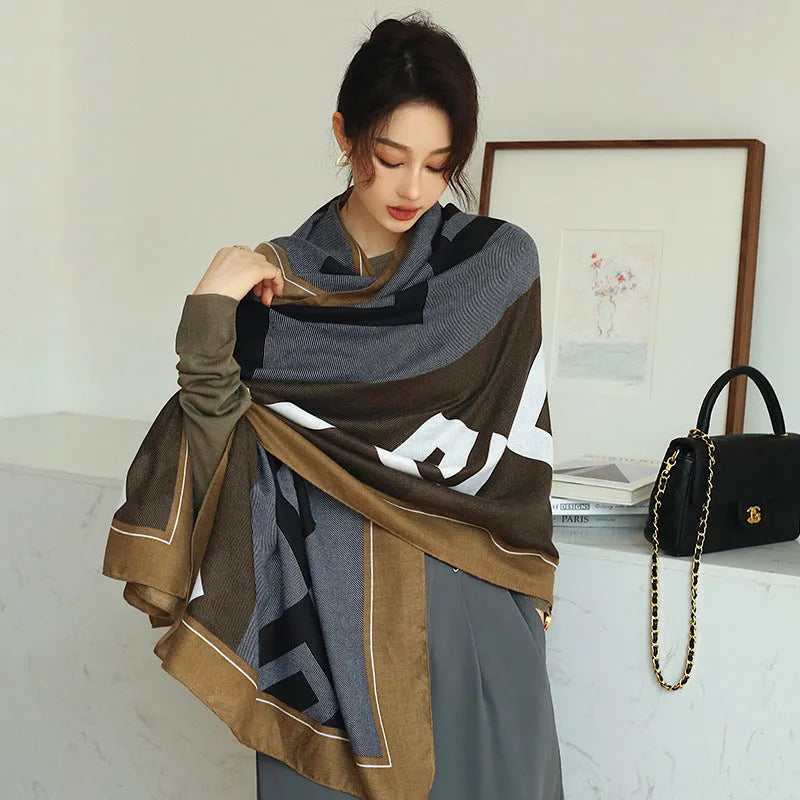 A woman wearing a long polyester scarf with fringe trim, shown in one of three available colour styles.