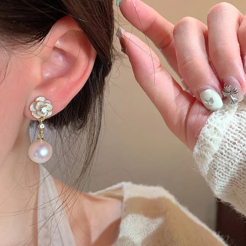 Camellia flower-shaped alloy stud earrings for women with floral design