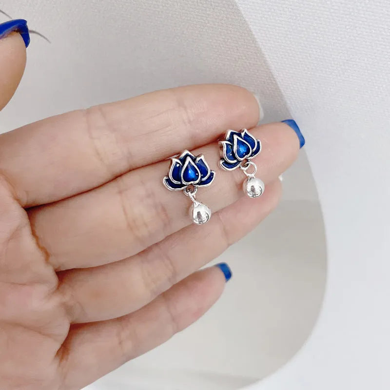 Blue Lotus earrings with lotus flower stud and seedpod tassel in vintage artistic style