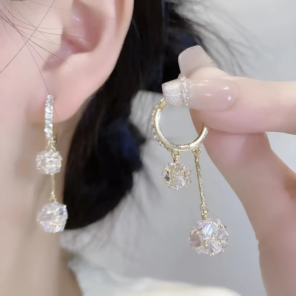 Silver confession balloon tassel ball earrings with rhinestone detailing on copper drop earrings