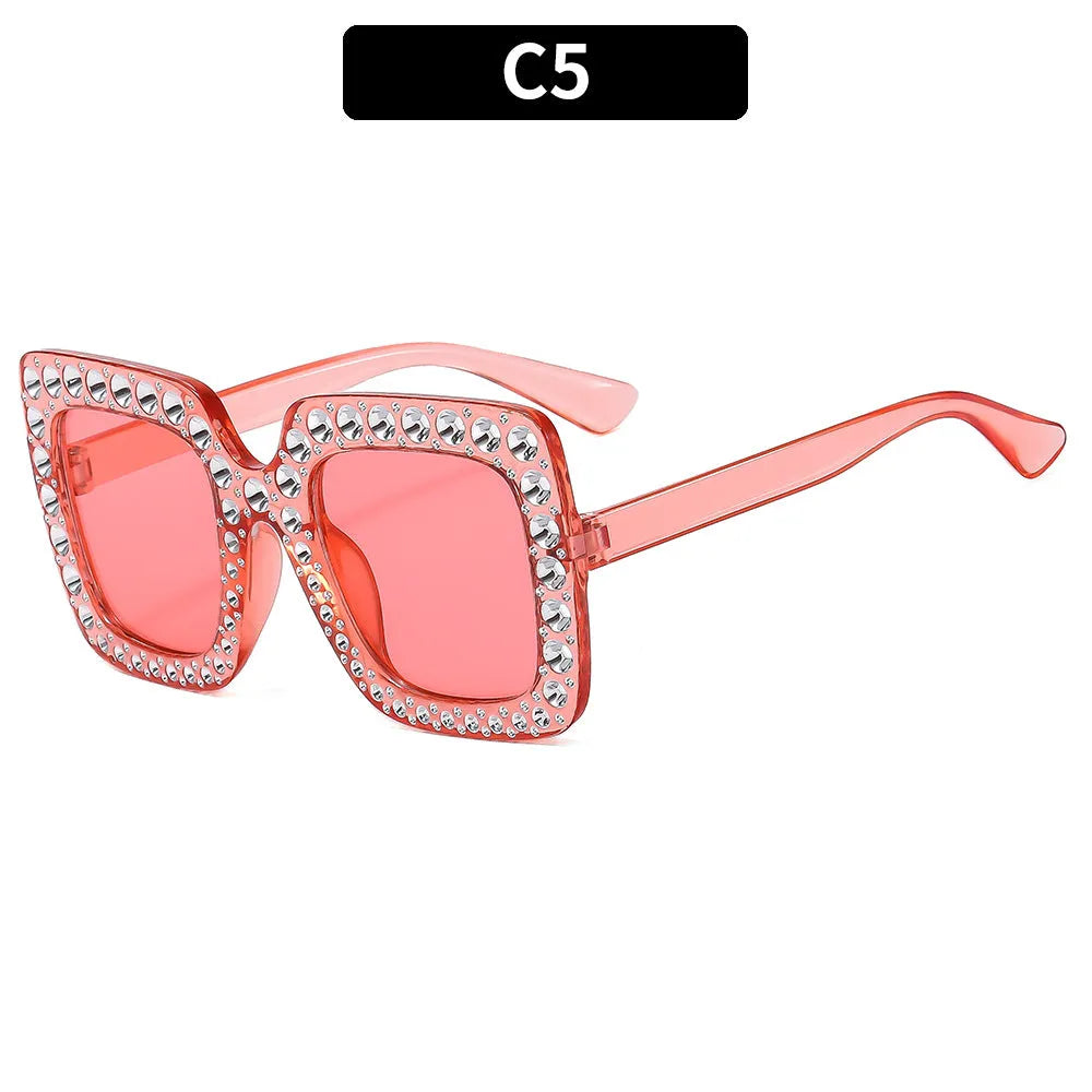 Plastic fashion sunglasses in a box showing various frame and lens colour options.