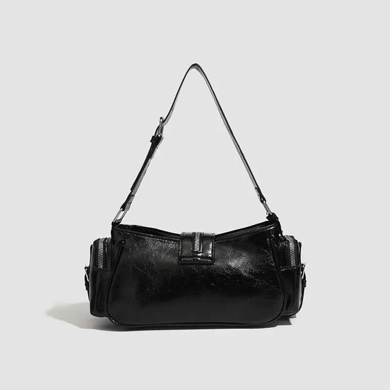 Black retro PU leather dumpling handbag with oil wax finish and three-dimensional pocket