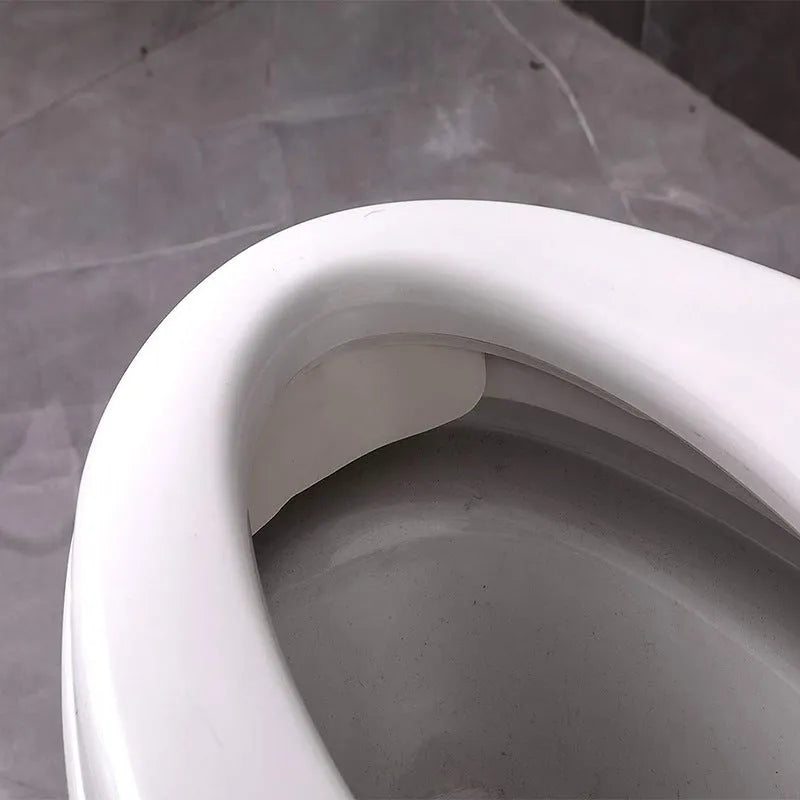 White curved PVC urine blocking board for children's toilet training against toilet