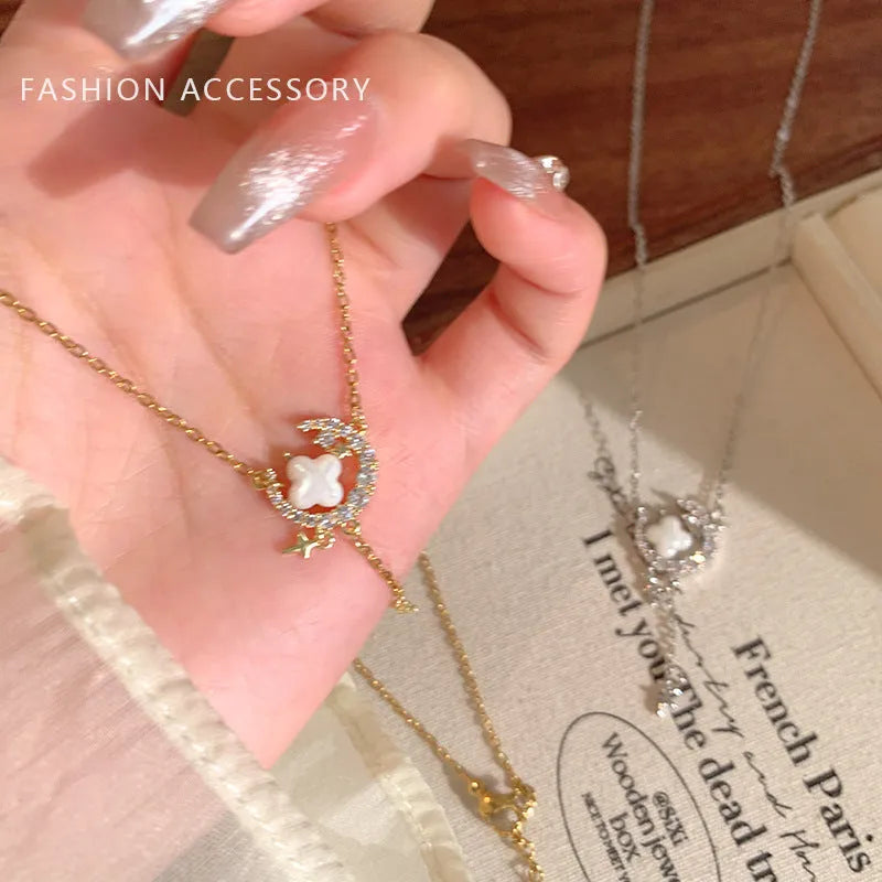 Gold or silver women's necklace with star moon zirconium pendant on adjustable chain.