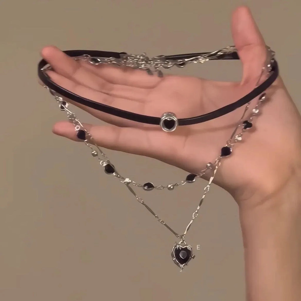 Women's multi-layer twin necklace set with leather heart pendants and adjustable clavicle chain