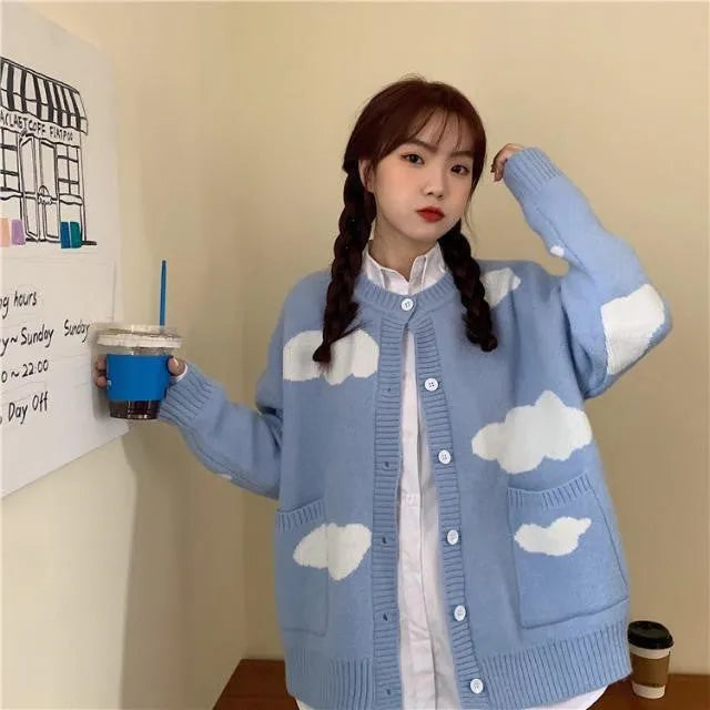 Blue cloud pattern women's loose cardigan sweater with long sleeves.