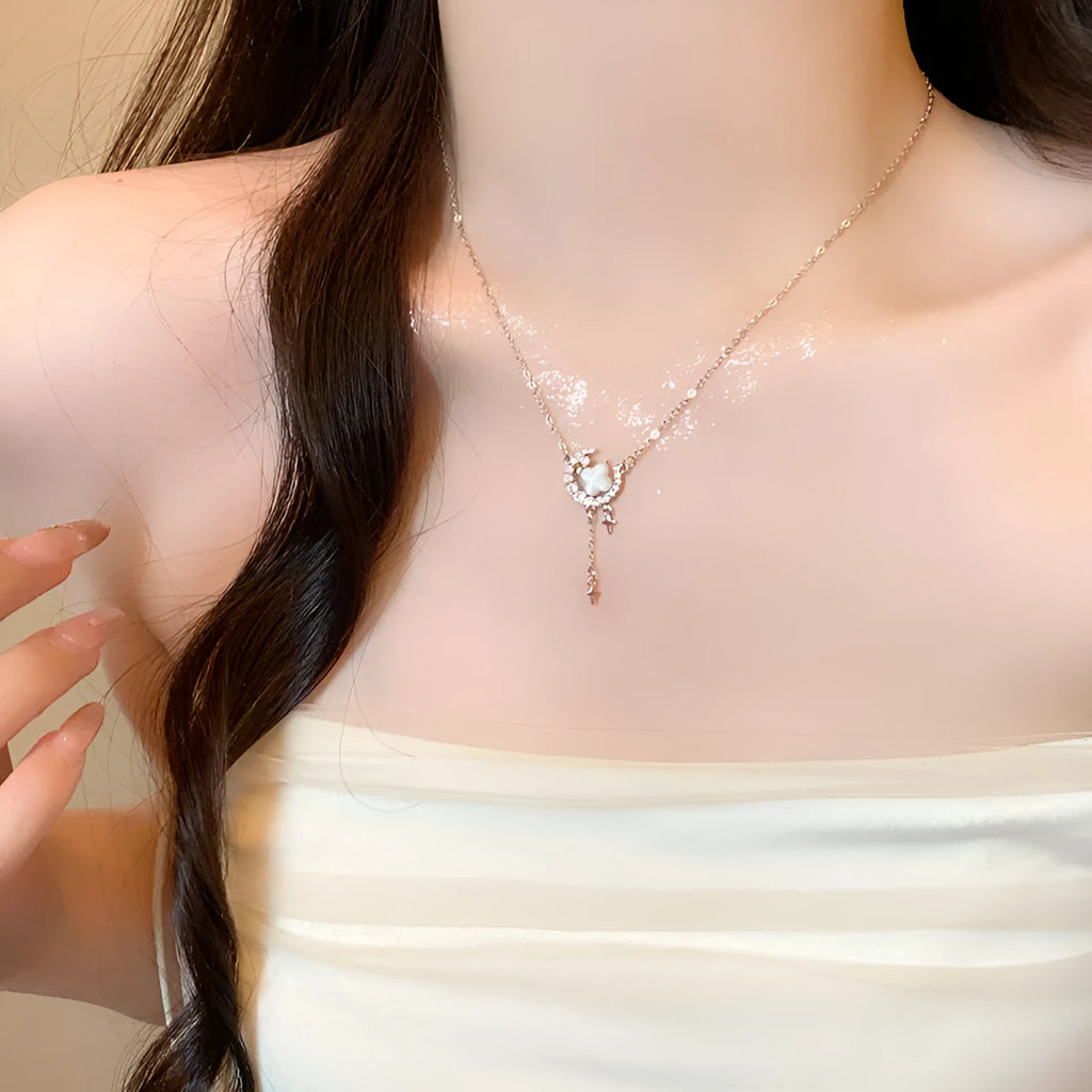 Gold or silver women's necklace with star moon zirconium pendant on adjustable chain.