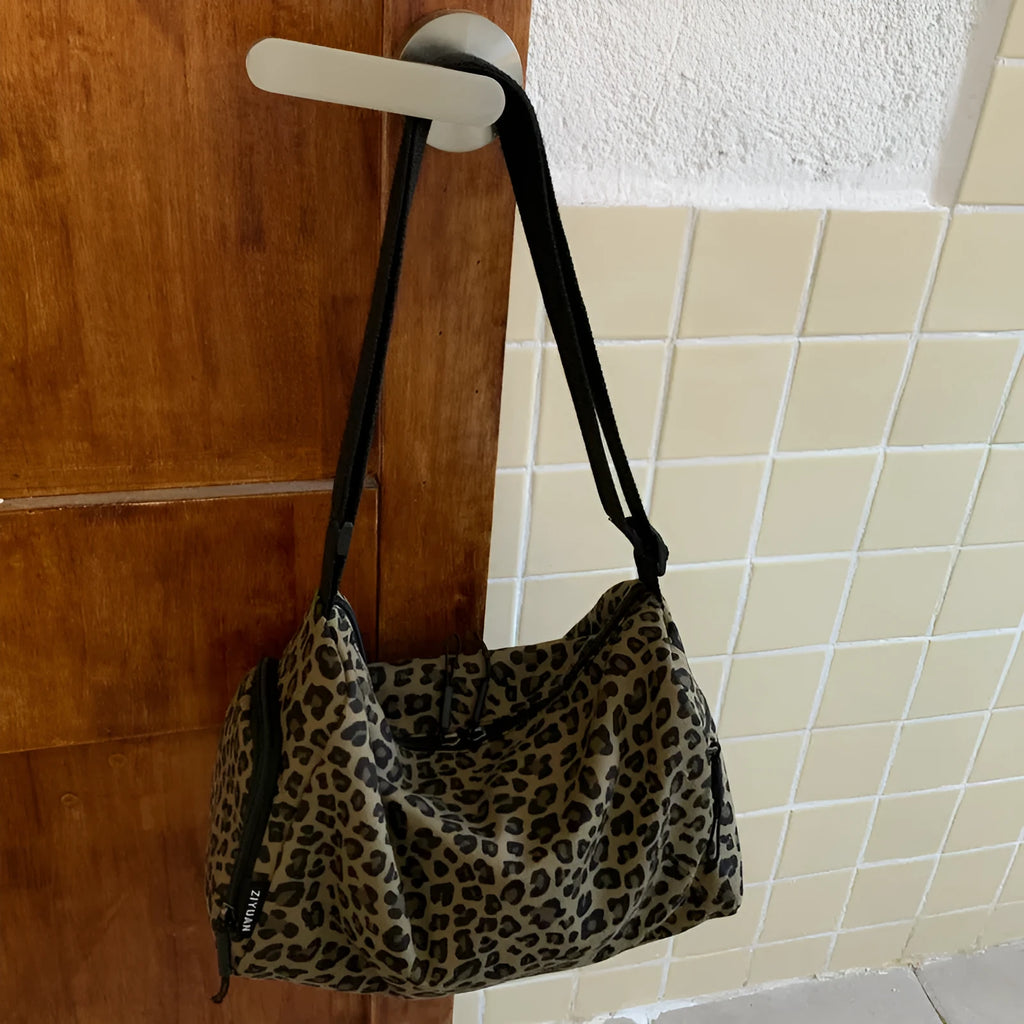Large leopard print sports messenger bag with stripes design and cross-body strap