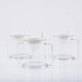 Clear transparent plastic spill-proof drinking cup with modern design.