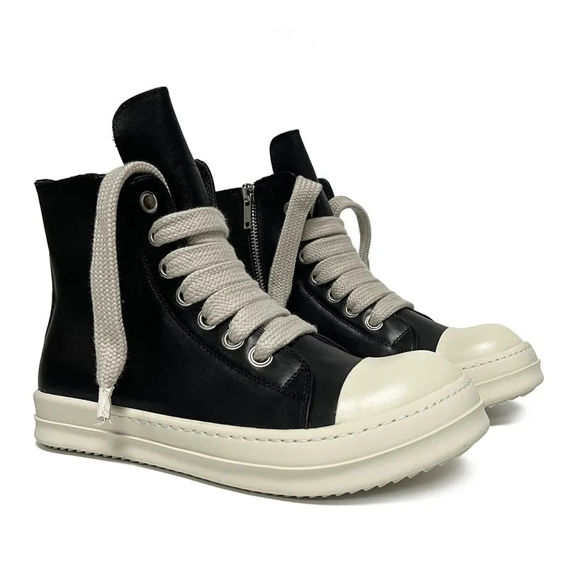 Black high-top leather sneakers with side zipper and round toe on a white background