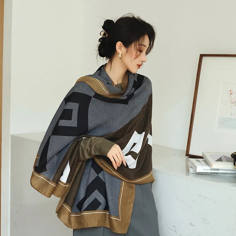 A woman wearing a long polyester scarf with fringe trim, shown in one of three available colour styles.