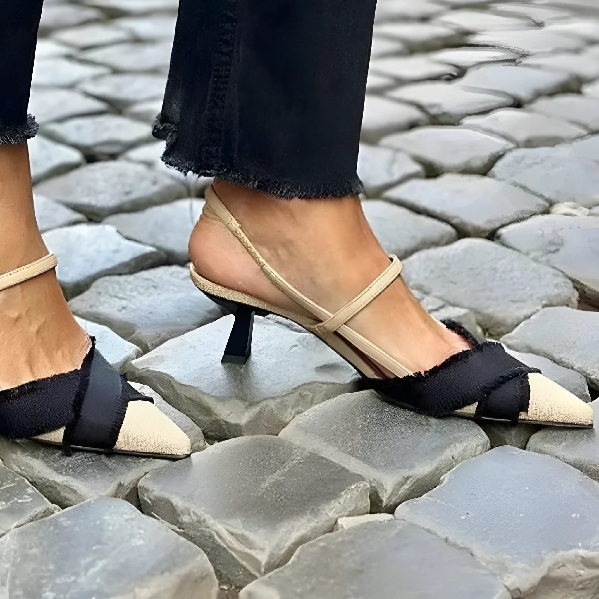 Women's apricot and black colour block stiletto heel sandals with pointed toe and buckle fastening.