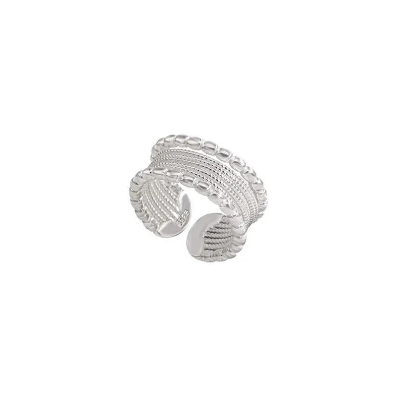 Adjustable copper alloy ring with woven twisted multilayer geometric design