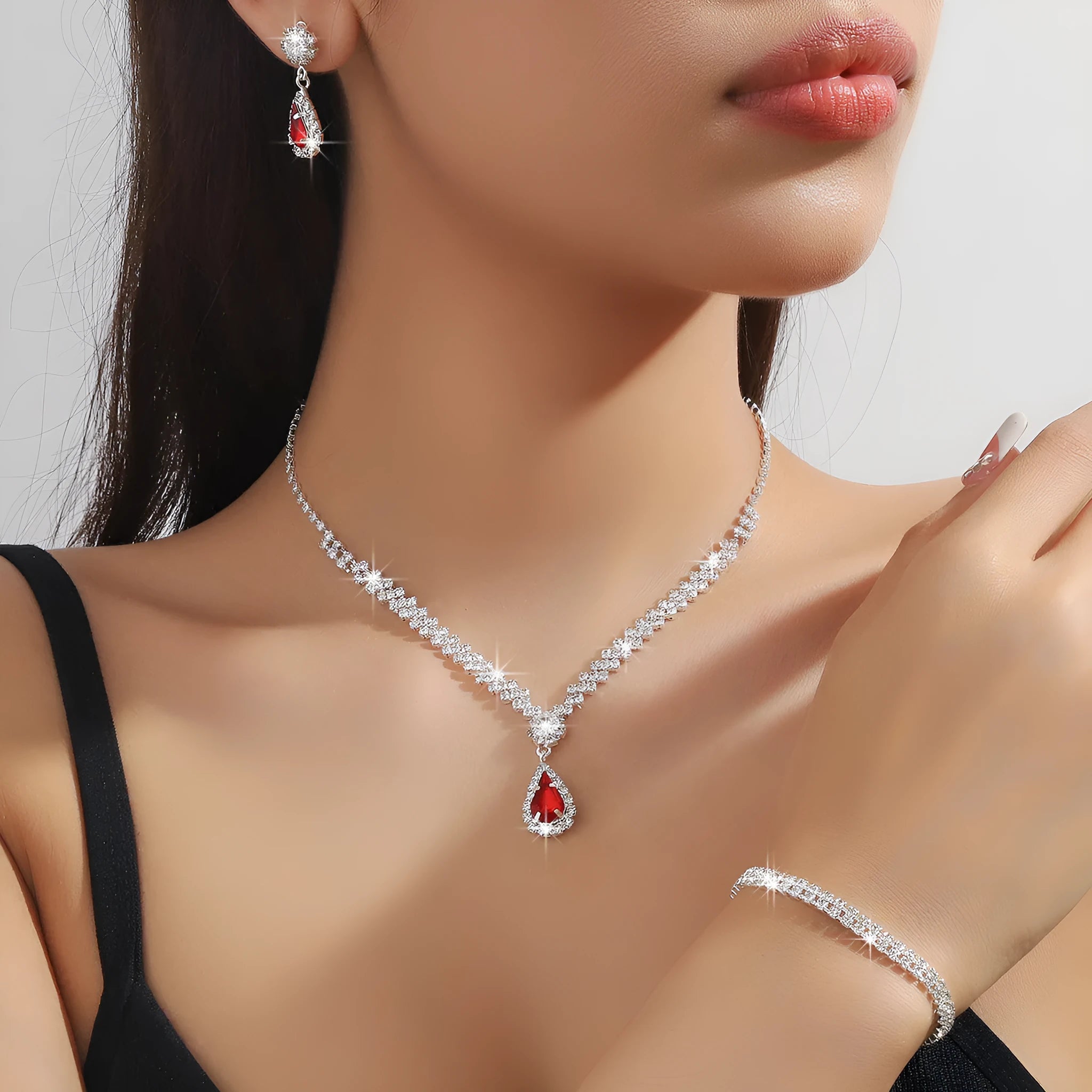 Claw chain rhinestone necklace and matching earrings set with water drop shapes