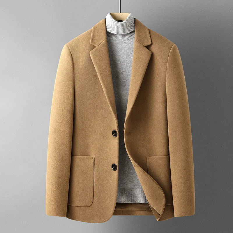 Men's slim fit wool suit jacket in grey, shown on a model, suitable for autumn and winter leisure wear.